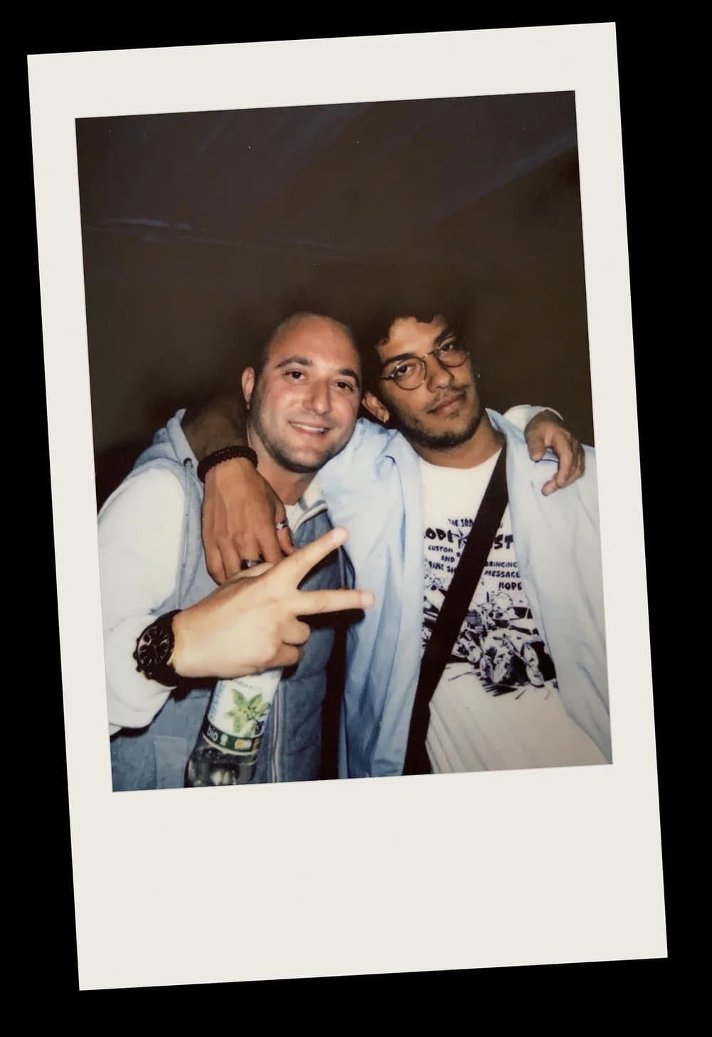 Instant photo from one of the evenings: two friends, arm in arm